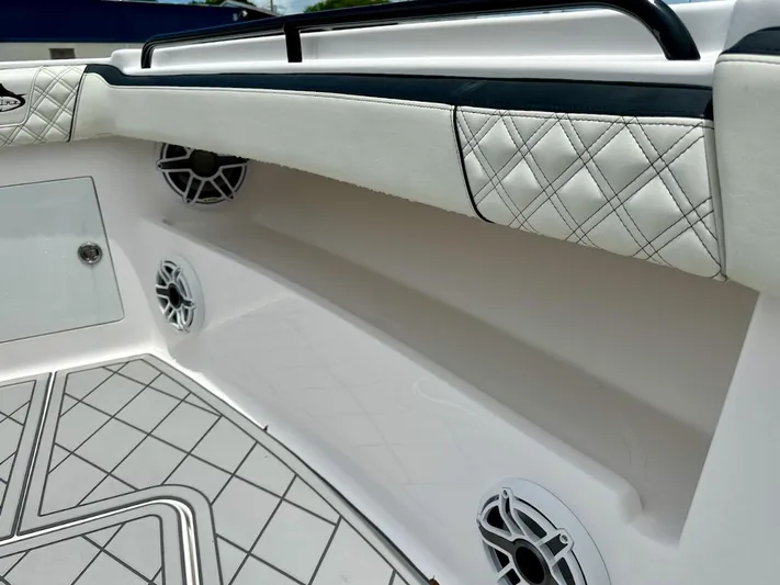  Yacht Photos Pics Streamline 35CC 2021 boat interior with quilted upholstery and built-in speakers.