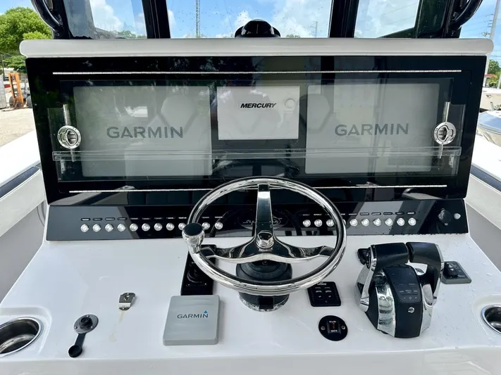  Yacht Photos Pics Streamline 35CC 2021 boat dashboard with Garmin displays and Mercury controls.