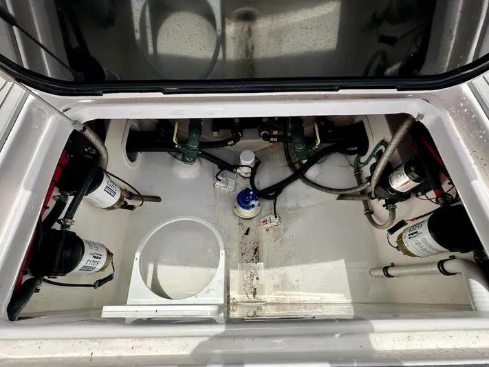 Yacht Photos Pics Engine compartment of 2021 Streamline 35CC boat, showing fuel filters and hoses.