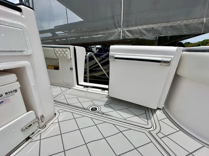  Yacht Photos Pics 2021 Streamline 35CC boat interior with open storage compartments and non-slip flooring.