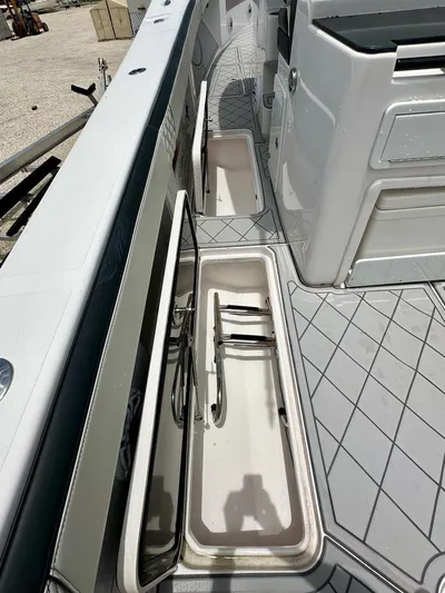  Yacht Photos Pics 2021 Streamline 35CC boat interior with open storage compartments and sleek design.