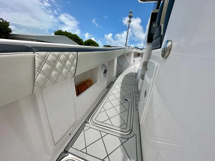  Yacht Photos Pics 2021 Streamline 35CC boat interior with sleek design and modern features under a blue sky.