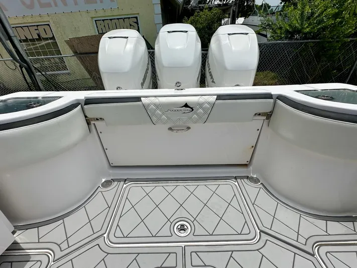  Yacht Photos Pics Streamline 35CC boat deck with triple outboard engines, 2021 model, featuring diamond-pattern flooring.