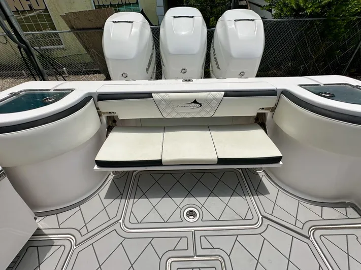  Yacht Photos Pics 2021 Streamline 35CC boat with triple Mercury engines and cushioned seating.