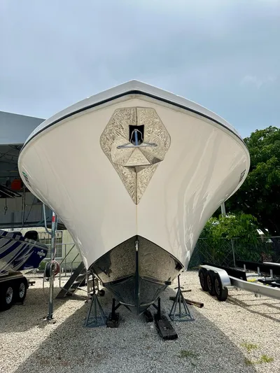  Yacht Photos Pics Front view of a 2021 Streamline 35CC boat on a trailer, parked outdoors.