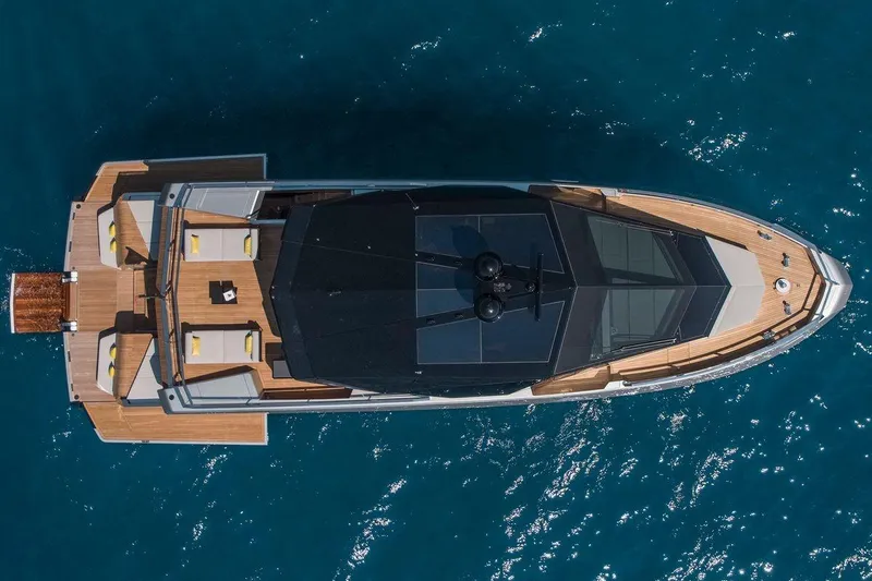 Carat Yacht Photos Pics Top view of 2024 Wally WallyWhy200 yacht on blue ocean water.
