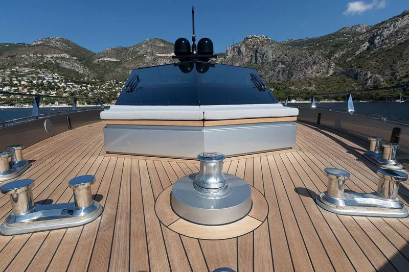 Carat Yacht Photos Pics Luxury 2024 WallyWhy200 yacht deck with scenic mountain backdrop.