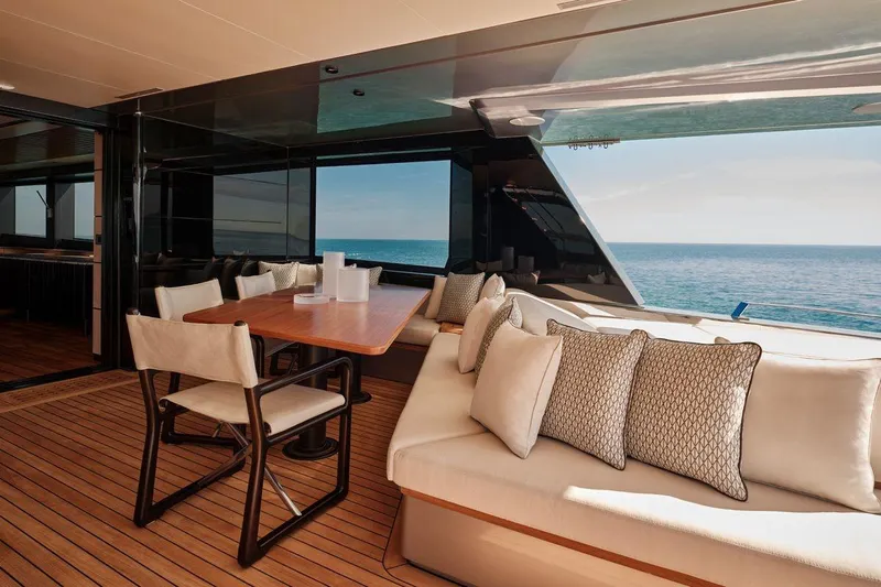 Carat Yacht Photos Pics Luxurious 2024 WallyWhy200 yacht interior with elegant seating and ocean view.