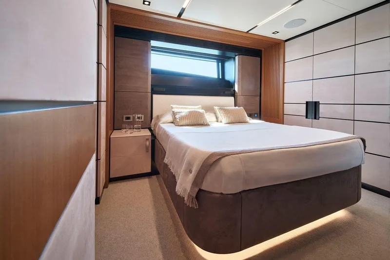 Carat Yacht Photos Pics Luxurious bedroom interior of 2024 Wally WallyWhy200 yacht with modern design and cozy ambiance.