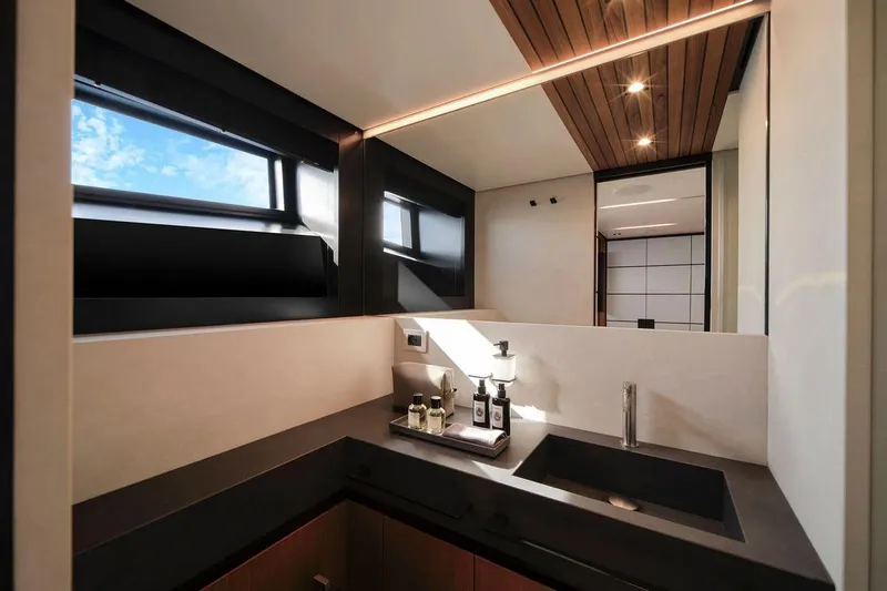 Carat Yacht Photos Pics Luxurious bathroom interior of 2024 Wally WallyWhy200 yacht with modern fixtures and sleek design.