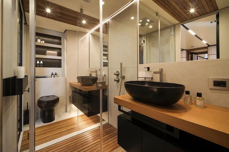 Carat Yacht Photos Pics Luxurious bathroom in 2024 Wally WallyWhy200 yacht with modern fixtures and wooden accents.