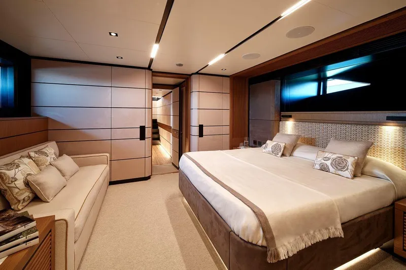 Carat Yacht Photos Pics Luxurious bedroom interior of 2024 Wally WallyWhy200 yacht, featuring elegant design and plush furnishings.