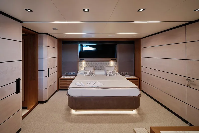 Carat Yacht Photos Pics Luxurious bedroom interior of 2024 Wally WallyWhy200 yacht, featuring modern design and elegant furnishings.