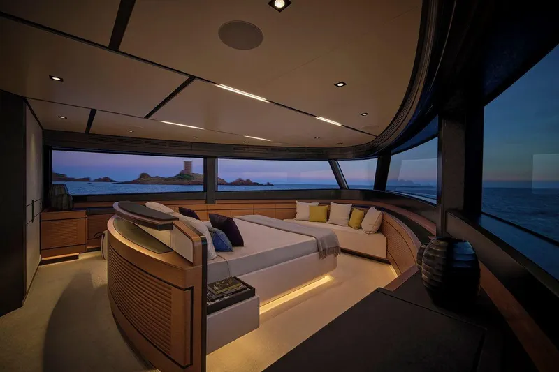 Carat Yacht Photos Pics Luxurious interior of 2024 WallyWhy200 yacht with panoramic ocean views at sunset.