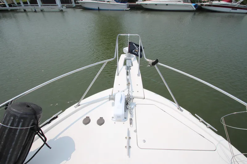  Yacht Photos Pics Bow view of 1996 Bayliner 3988 Command Bridge Motoryacht docked in marina.