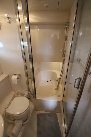  Yacht Photos Pics Bathroom in 1996 Bayliner 3988 Command Bridge Motoryacht with shower and toilet.