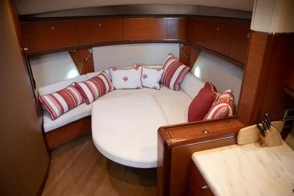 Gazelle Yacht Photos Pics Luxurious interior of 2014 Zeelander Z44 yacht with cozy seating and decorative pillows.