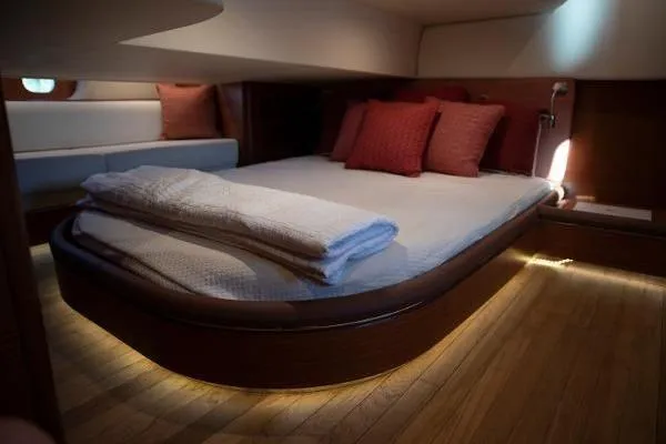 Gazelle Yacht Photos Pics Luxurious cabin interior of 2014 Zeelander Z44 yacht with cozy bedding and ambient lighting.