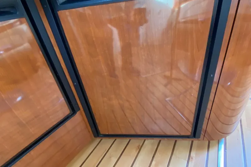 2 Life Yacht Photos Pics Polished wooden interior of a 2003 Sea Ray Sundancer yacht.