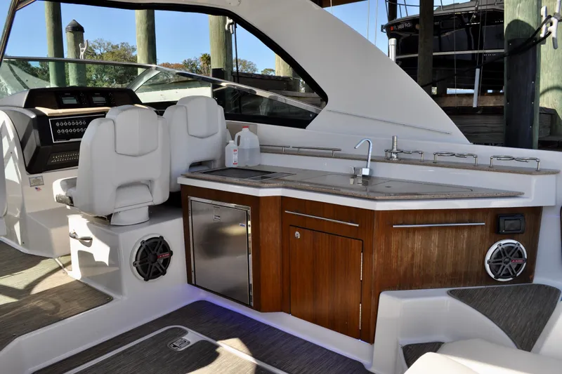  Yacht Photos Pics 2019 Four Winns H350 OB boat interior with seating, kitchenette, and modern amenities.