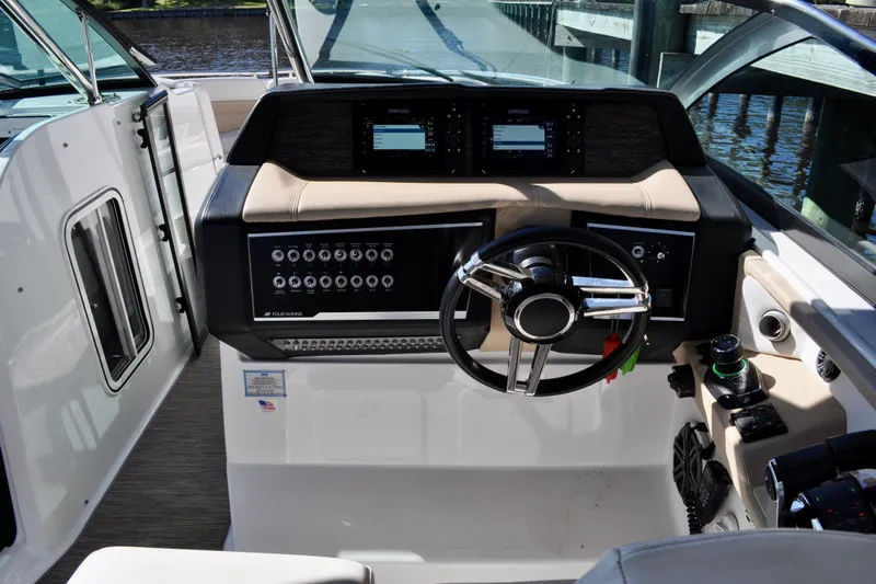  Yacht Photos Pics 2019 Four Winns H350 OB helm with modern controls and sleek steering wheel.
