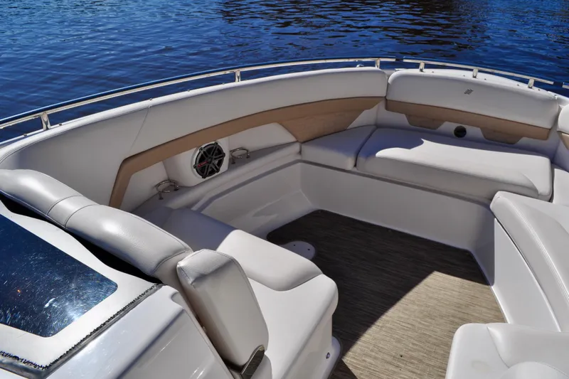  Yacht Photos Pics 2019 Four Winns H350 OB boat interior with cushioned seating and water view.