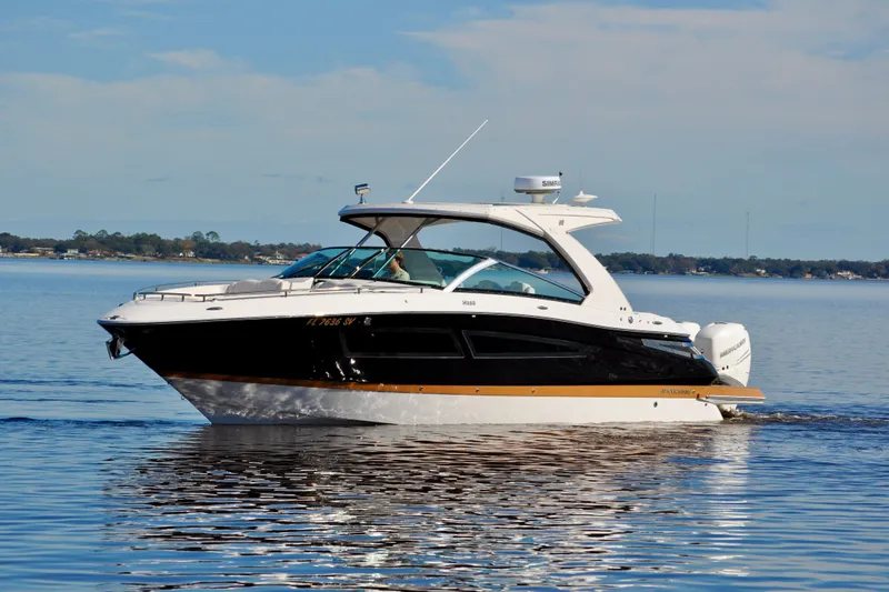  Yacht Photos Pics 2019 Four Winns H350 OB boat cruising on calm water.