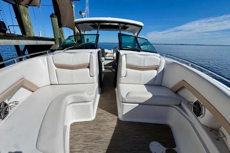  Yacht Photos Pics 2019 Four Winns H350 OB boat interior with white seating and open water view.