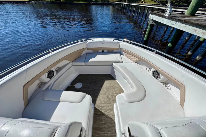  Yacht Photos Pics 2019 Four Winns H350 OB boat interior with spacious seating and waterfront view.