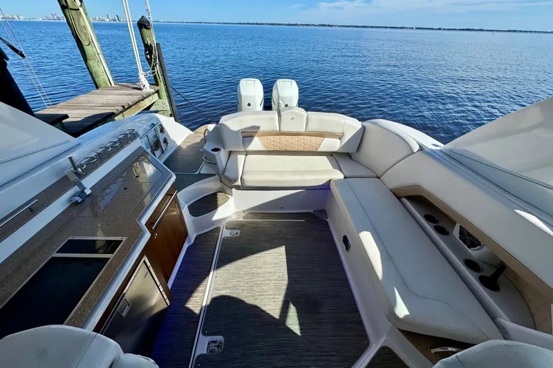  Yacht Photos Pics Luxurious 2019 Four Winns H350 OB boat interior with spacious seating and scenic water view.