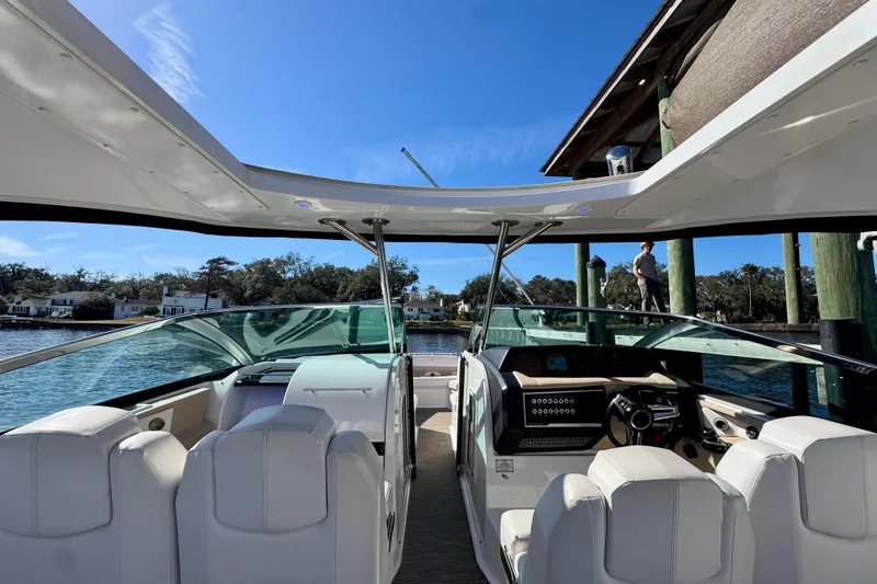  Yacht Photos Pics 2019 Four Winns H350 OB boat interior with luxurious seating and modern dashboard.