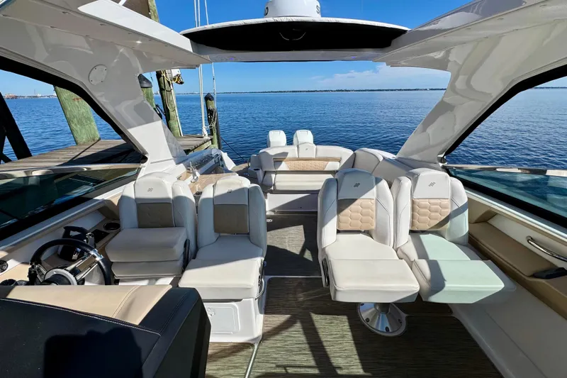  Yacht Photos Pics 2019 Four Winns H350 OB boat interior with luxurious seating and open water view.