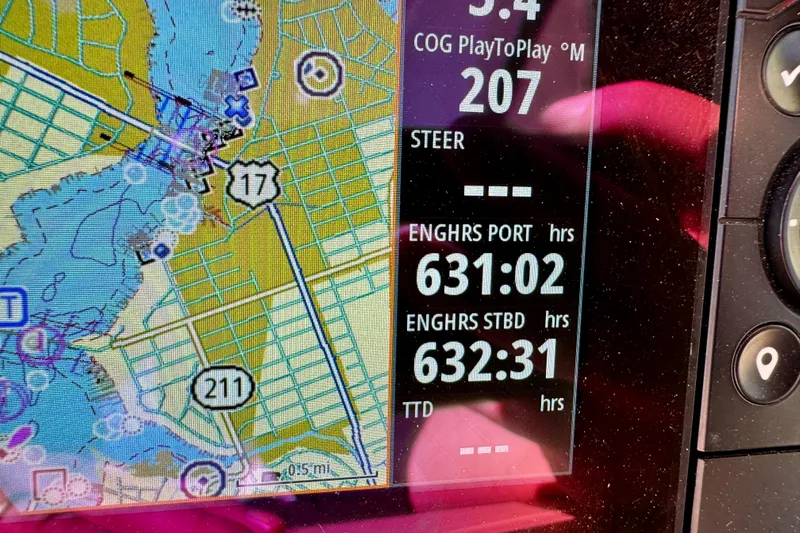  Yacht Photos Pics Boat navigation display showing engine hours and map on a 2019 Four Winns H350 OB.