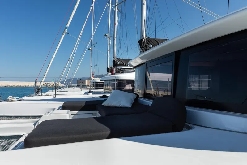 Twenty Cent Yacht Photos Pics Luxurious 2021 Lagoon 46 yacht with sleek design and comfortable deck seating.