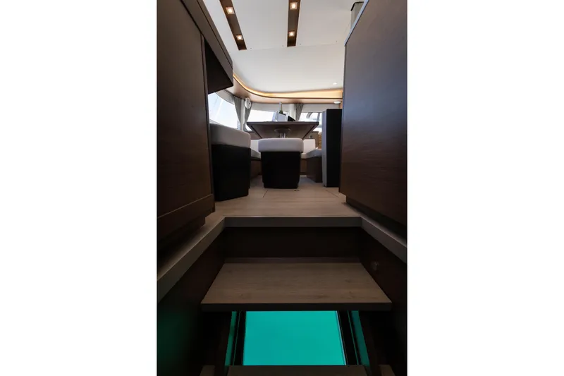 Twenty Cent Yacht Photos Pics Interior view of 2021 Lagoon 46 yacht, showcasing modern design and elegant wood finishes.