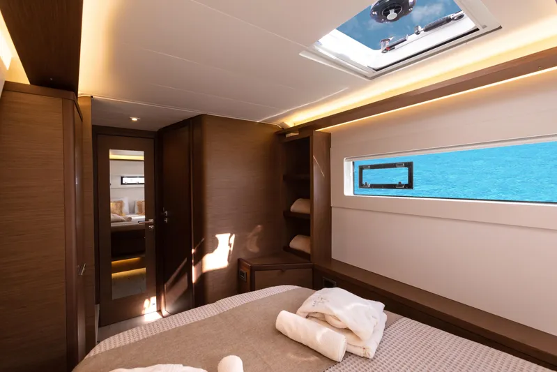 Twenty Cent Yacht Photos Pics Luxurious cabin interior of 2021 Lagoon 46 yacht with ocean view.