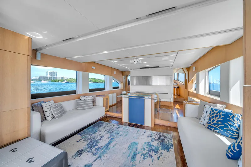 Therapy Yacht Photos Pics Luxurious interior of 2008 Aicon 75 Flybridge yacht with modern furnishings and ocean view.