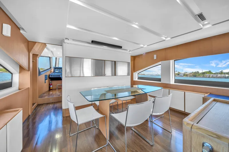 Therapy Yacht Photos Pics Luxurious interior of 2008 Aicon 75 Flybridge yacht with modern dining area.