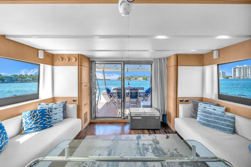 Therapy Yacht Photos Pics Luxurious interior of 2008 Aicon 75 Flybridge yacht with ocean view.