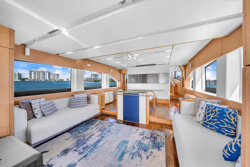 Therapy Yacht Photos Pics Luxurious interior of 2008 Aicon 75 Flybridge yacht with modern decor and scenic views.