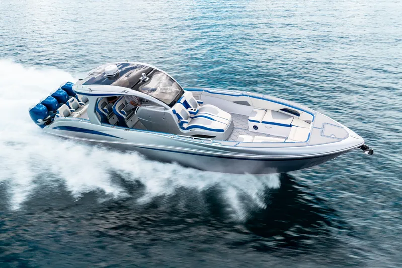  Yacht Photos Pics 2019 Deep Impact 399 Sport boat cruising on open water, showcasing sleek design and powerful engines.