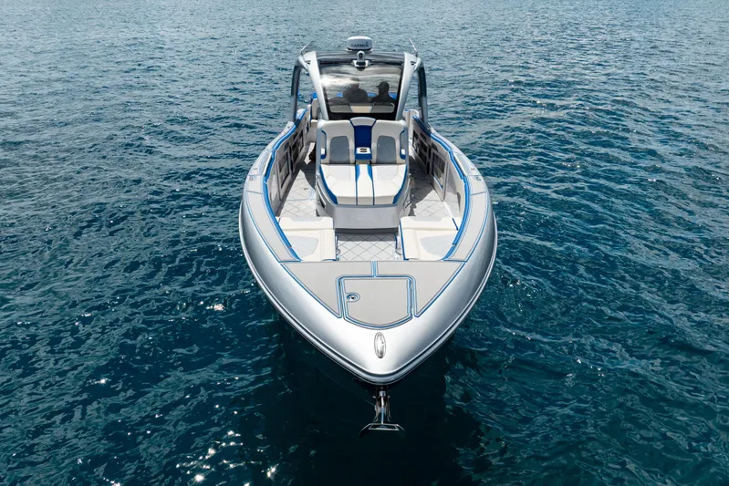  Yacht Photos Pics 2019 Deep Impact 399 Sport boat on open water, showcasing sleek design and luxury features.