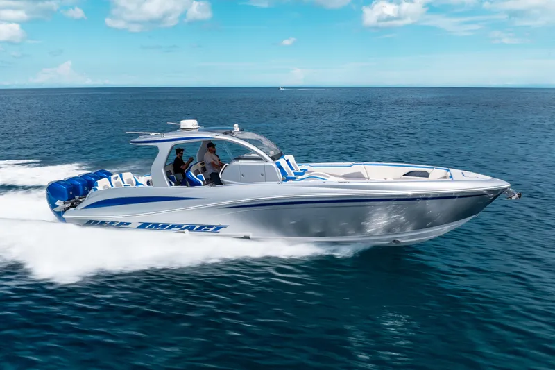  Yacht Photos Pics 2019 Deep Impact 399 Sport boat cruising on open water, showcasing sleek design and powerful engines.