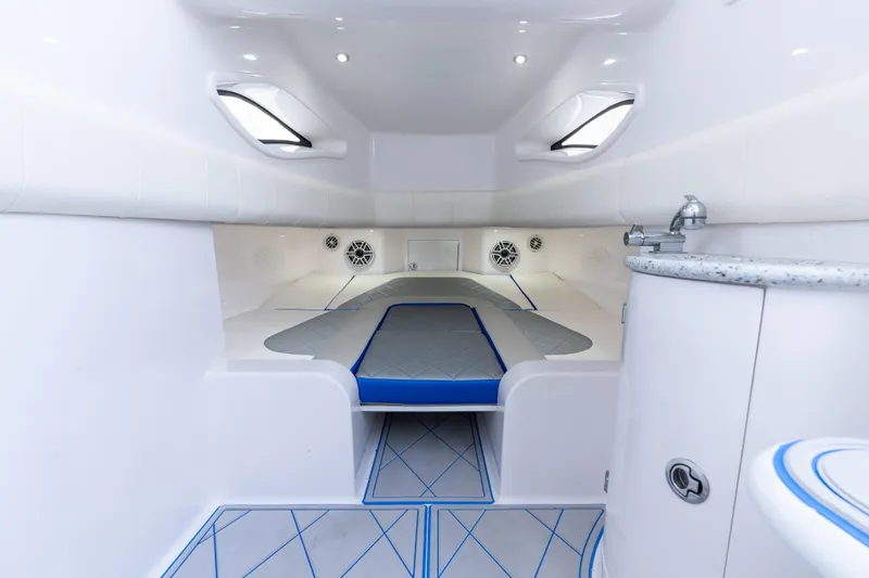  Yacht Photos Pics Interior of 2019 Deep Impact 399 Sport boat, featuring sleek white cabin design.
