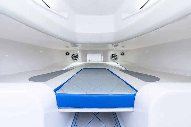  Yacht Photos Pics Interior cabin of 2019 Deep Impact 399 Sport boat with modern design and blue accents.