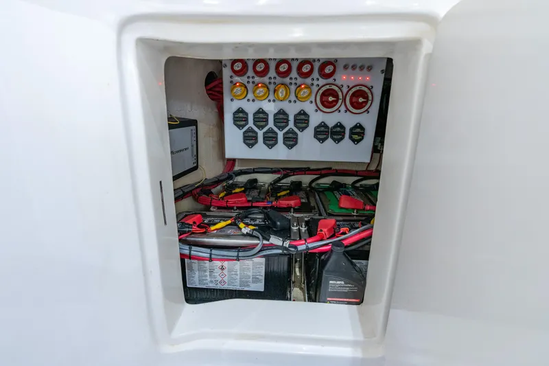  Yacht Photos Pics Electrical panel and battery compartment of 2019 Deep Impact 399 Sport boat.