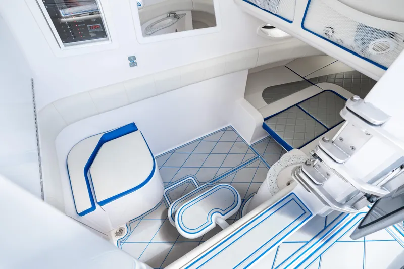  Yacht Photos Pics 2019 Deep Impact 399 Sport interior with modern white and blue design.
