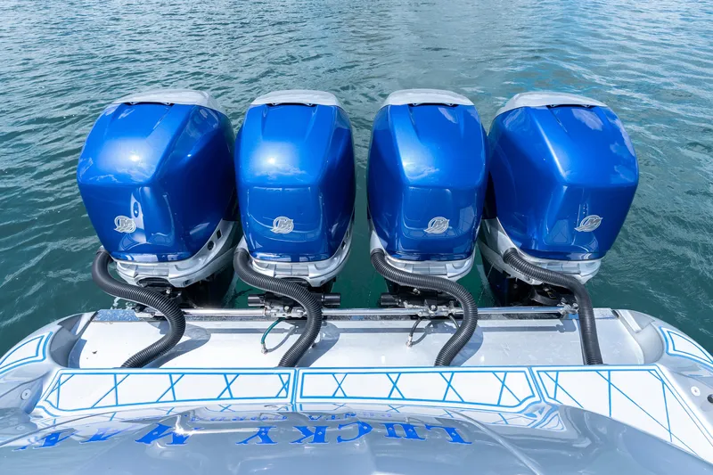 Yacht Photos Pics Four blue outboard motors on a 2019 Deep Impact 399 Sport boat.