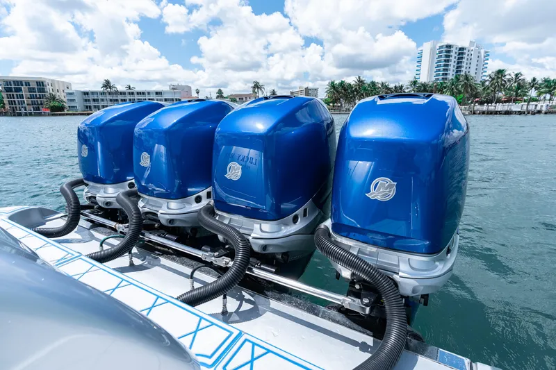  Yacht Photos Pics Four blue outboard motors on a 2019 Deep Impact 399 Sport boat.