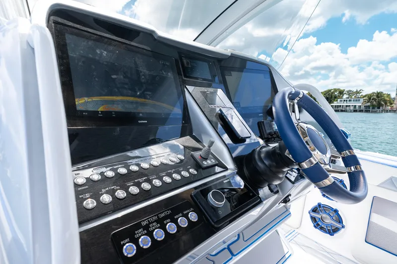  Yacht Photos Pics Control panel of 2019 Deep Impact 399 Sport boat with advanced navigation system.